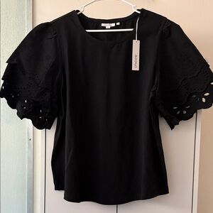 Chico's Elegant Black Blouse with Eyelet Sleeves